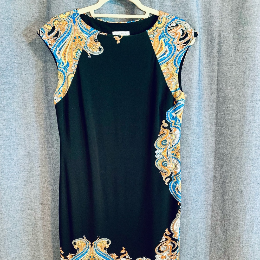 NEW never worn striking cap sleeve body con dress